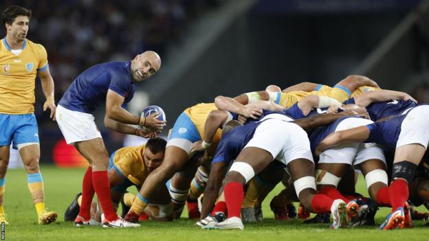 Maxime Lucu feeds the ball into a France scrum