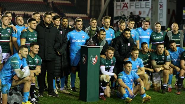 Ed Slater with the Gloucester and Leicester teams and the Slater Cup last season