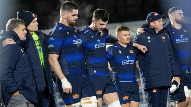 Blair Kinghorn (centre) and his Edinburgh team-mates are left disappointed