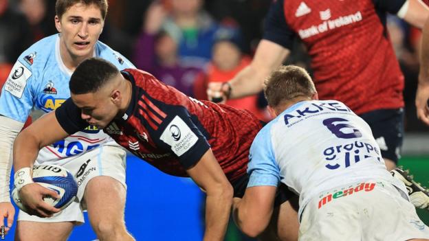 Shay McCarthy prepares to dot down for Munster's first try of the game