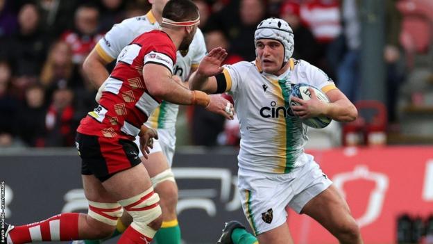 Saints hooker Curtis Langdon is tackled by Gloucester flanker Lewis Ludlow