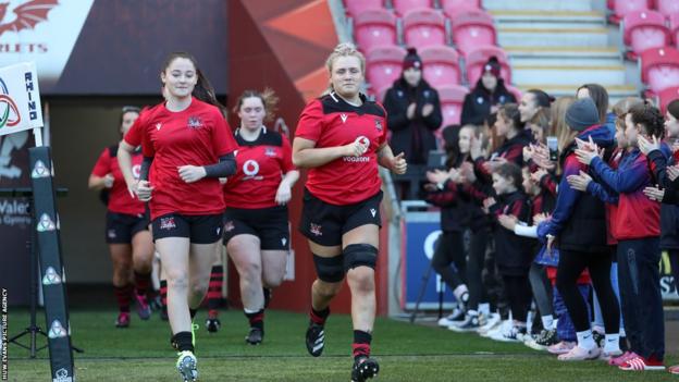 Alex Callender leads her team out at Parc y Scarlets