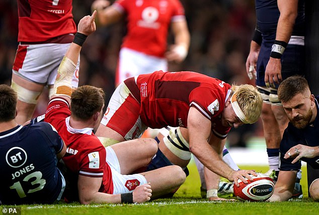 Wales scored 26 unanswered points after trailing 27-0 early in the second half, with Man of the Match Aaron Wainwright (middle) scoring his side's third try