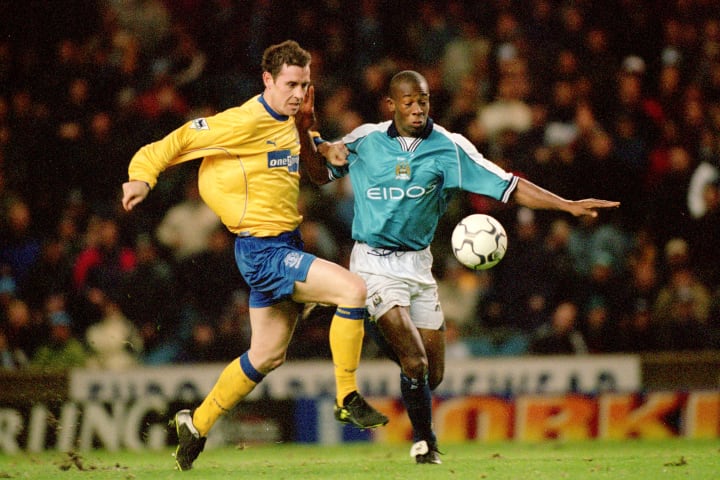 Paulo Wanchope and David Weir