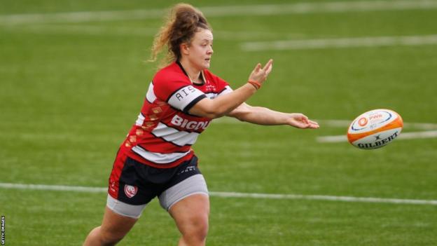 Llecu George of Gloucester-Hartpury spins a pass out wide