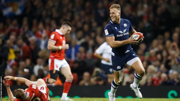 Duhan van der Merwe of Scotland scores a try