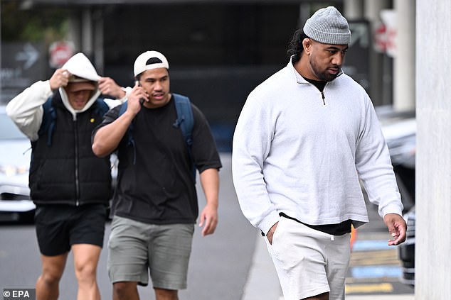 Melbourne star Pone Fa'amausili (right) and two of his teammates leave a team meeting on Thursday, shortly after the shocking news broke