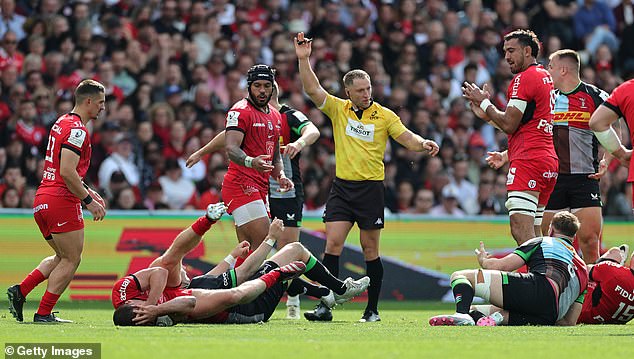 Walker was shown a yellow card after he made contact with head of Antoine Dupont