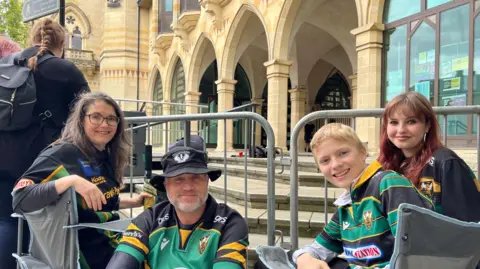 Harriet Heywood/BBC Kerry with her family in Northampton