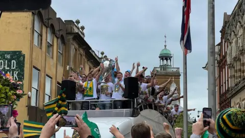 Harriet Heywood/BBC Northampton Saints players on the parade bus