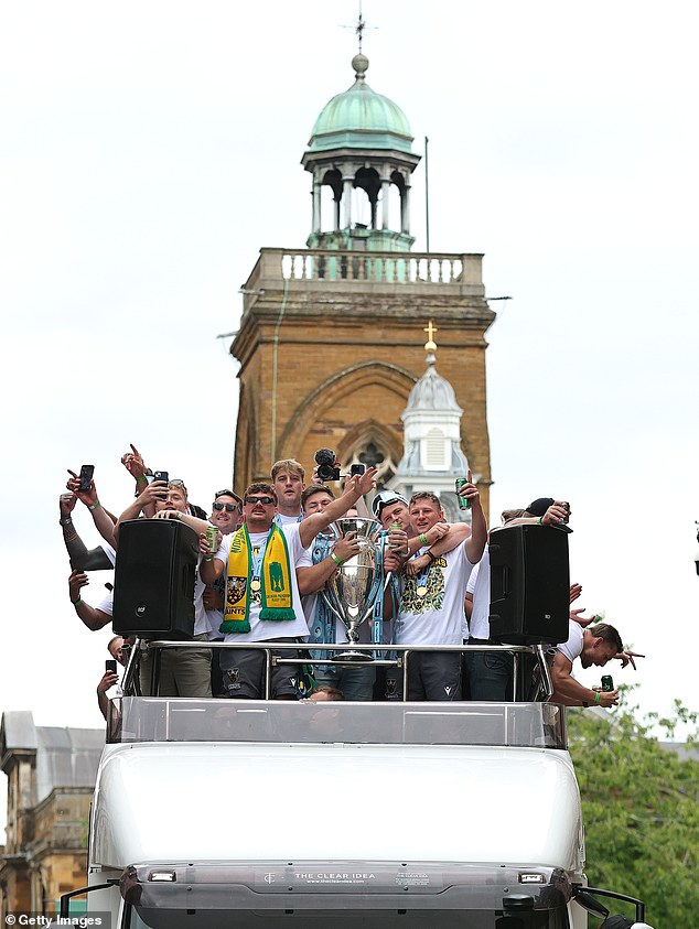 The Northampton players including Fin Smith enjoyed a parade after their title win