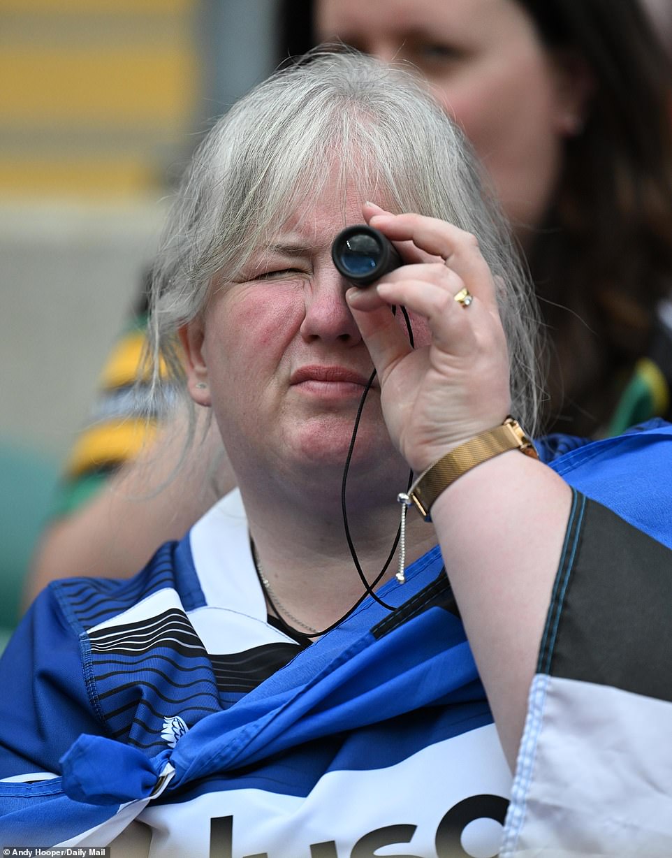 Spectators couldn't help but try and get a closer look at the action after the game got underway on a pulsating afternoon