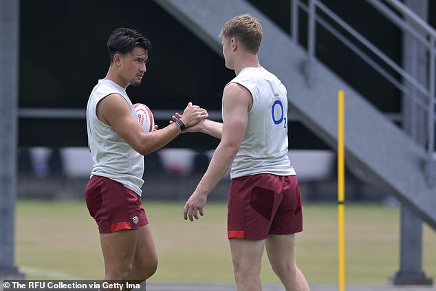 The two Smiths embrace during England training in Japan earlier this week