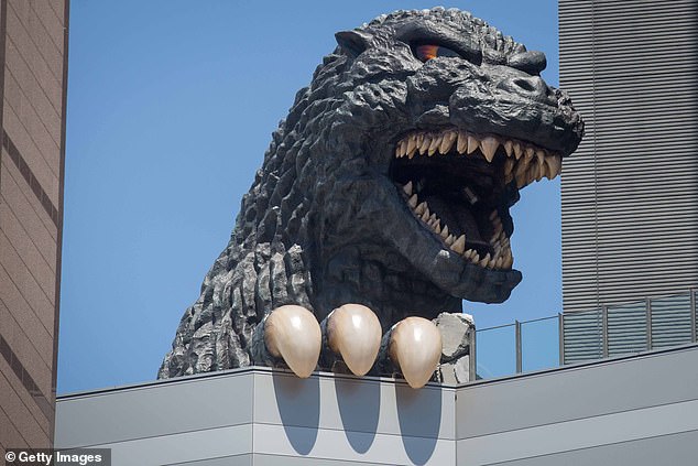 Marler and Dan Cole went to see the Godzilla statue in Shinjuku during their time away