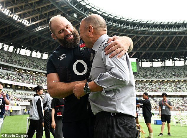 Joe Marler pictured with Japan and former England head coach Eddie Jones after the game