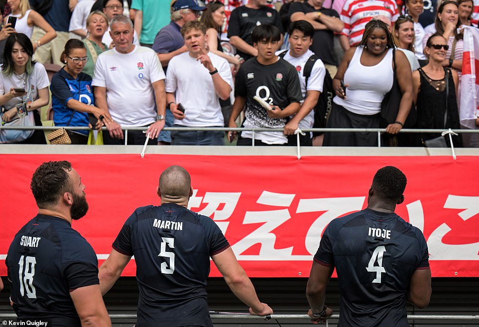 Will Stuart (left), George Martin (centre) and Maro Itoje (right) chat to and engage with fans at the Japan National Stadium