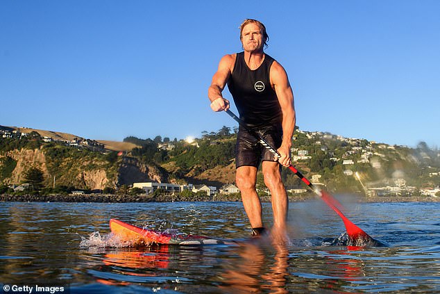 New Zealand head coach Scott Robertson (pictured) enjoys surfing, but only narrowly escaped a man-eating shark in South Africa in 2018