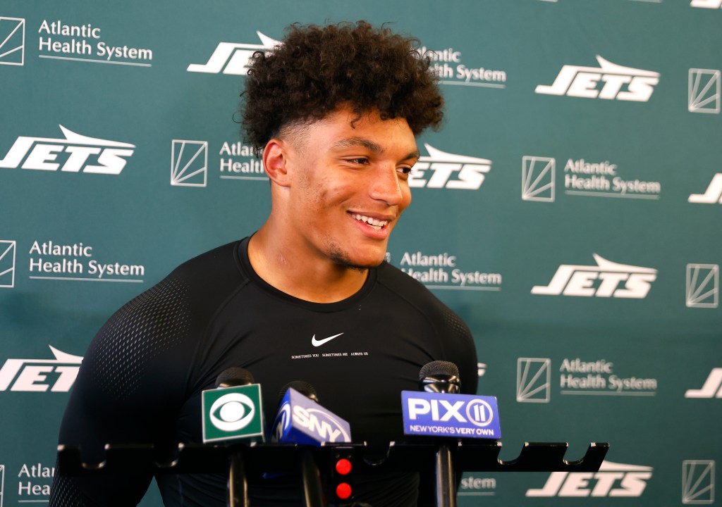 Jets running back Braelon Allen answers questions from reporters during practice