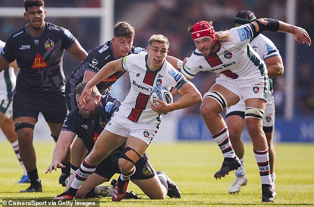 Leicester scrum-half Jack van Poortvliet evades a tackle against Exeter