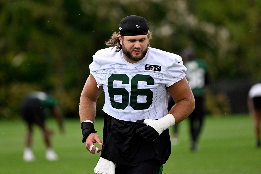 Center Joe Tippmann attributed the Jets' improvement on third downs to Aaron Rodgers.