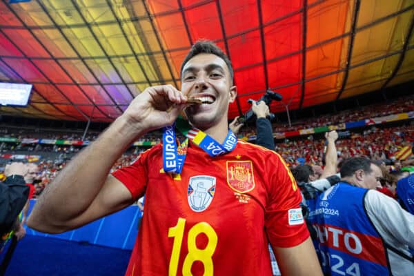 BERLIN, GERMANY - Sunday, July 14, 2024: Spain's Spain's Martín Zubimendi celebrates by biting his winners' medal after the UEFA Euro 2024 Final match between Spain and England at the Olympiastadion. Spain won 2-1. (Photo by David Rawcliffe/Propaganda)