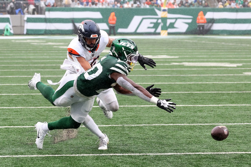 Breece Hall can't hang onto the football during the Jets' loss to the Broncos on Sept. 29.