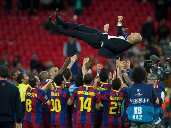 LONDON, ENGLAND, Saturday, May 28, 2011: FC Barcelona's head coach Josep Guardiola is thrown into the air by his squad as he celebrates winning the European Cup after thrashing Manchester United 3-1 during the UEFA Champions League Final at Wembley Stadium. (Photo by Chris Brunskill/Propaganda)