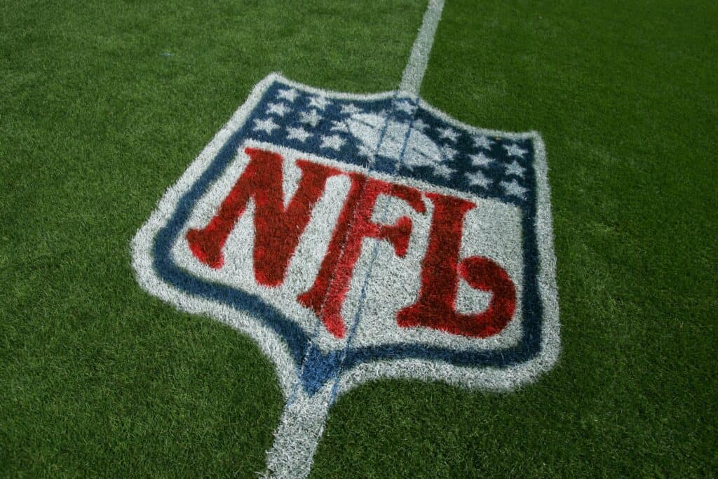 DENVER - SEPTEMBER 16: Detail view of a logo of the National Football League is painted on the field as the Denver Broncos defeated the Oakland Raiders 23-20 in overtime during week two NFL action at Invesco Field at Mile High on September 16, 2007 in Denver, Colorado.