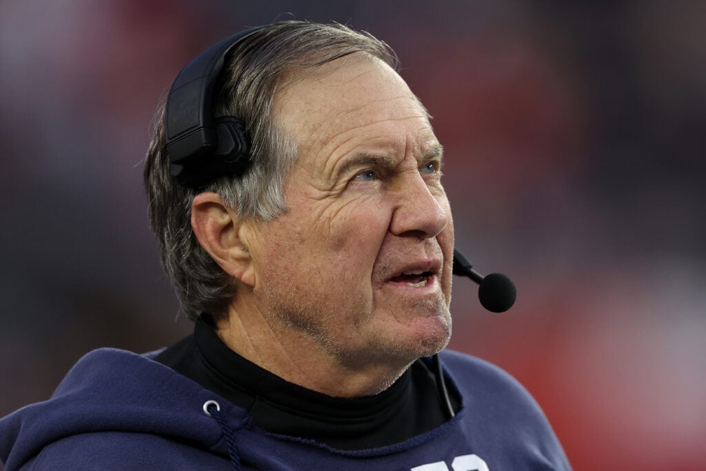 FOXBOROUGH, MASSACHUSETTS - DECEMBER 17: New England Patriots head coach Bill Belichick looks on from the sideline during the game against the Kansas City Chiefs at Gillette Stadium on December 17, 2023 in Foxborough, Massachusetts.