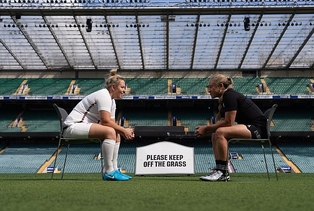 Packer chatted merrily away with her opposite number Kennedy Simon (also pictured)