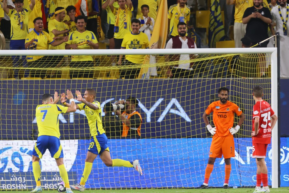 Angelo celebrated with Ronaldo after scoring the opener