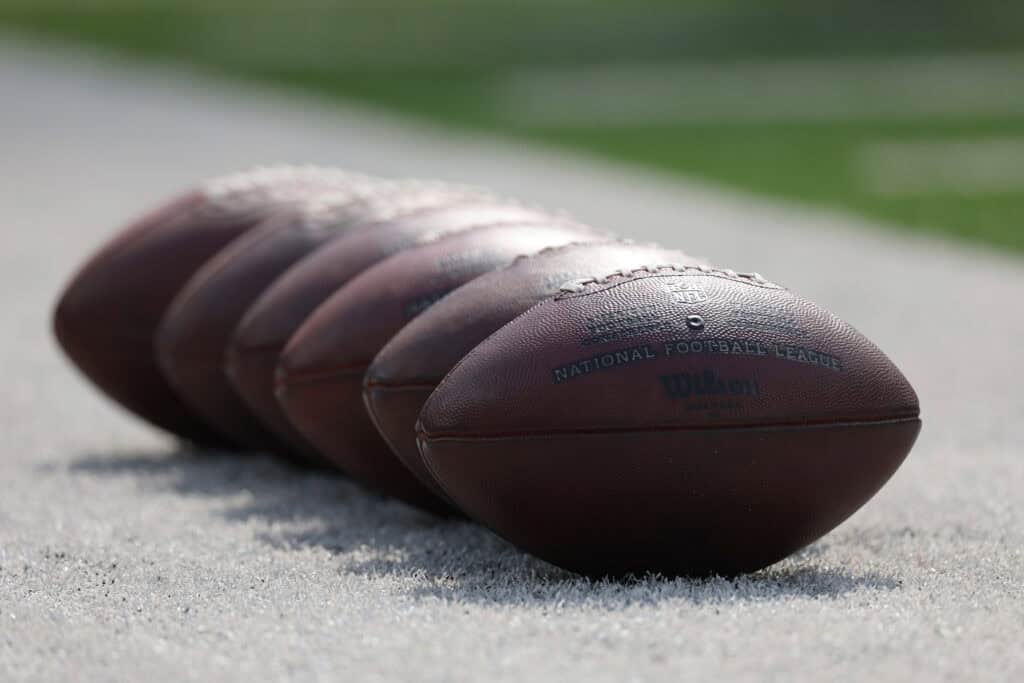 INGLEWOOD, CALIFORNIA - OCTOBER 15: A detailed view of footballs on the field before the game between the Arizona Cardinals and the Los Angeles Rams at SoFi Stadium on October 15, 2023 in Inglewood, California.