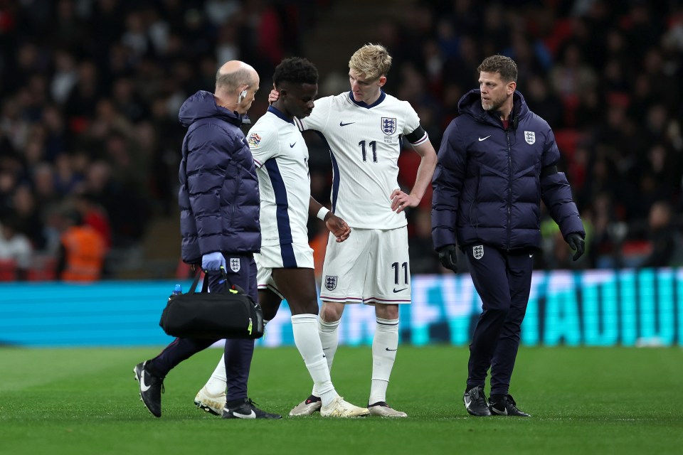 Gordon consoles Saka after the latter was forced off with injury