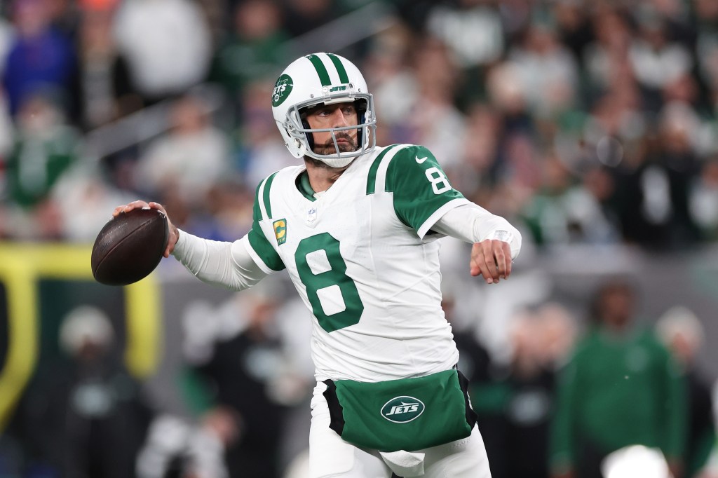 Aaron Rodgers #8 of the New York Jets throws a pass during the first quarter against the Buffalo Bills at MetLife Stadium on October 14, 2024 in East Rutherford, New Jersey. (Photo by Luke Hales/Getty Images)