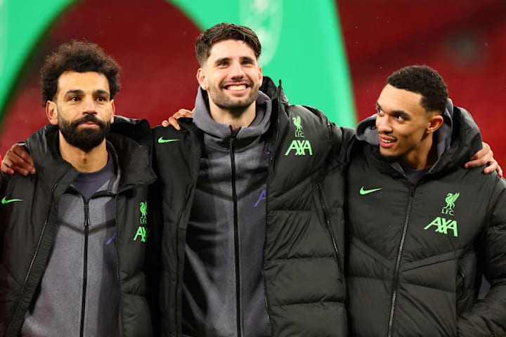 Mohamed Salah, Trent Alexander-Arnold, Dominik Szoboszlai of Liverpool pose together