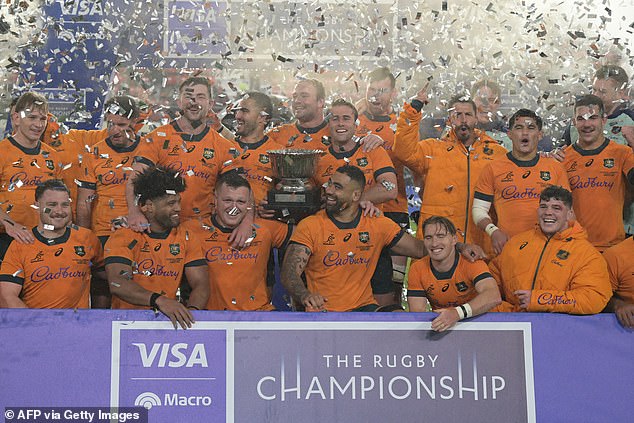 The Wallabies celebrate after defeat Argentina's Los Pumas in the Rugby Championship