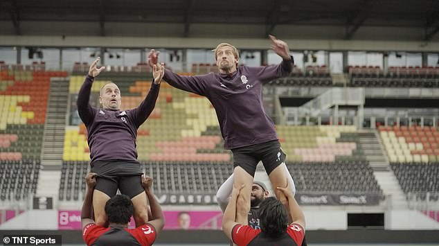 Hilarity ensues as the former footballers contest a rugby line-out