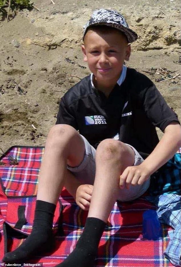 Love is pictured wearing an All Blacks top back when he was a schoolboy