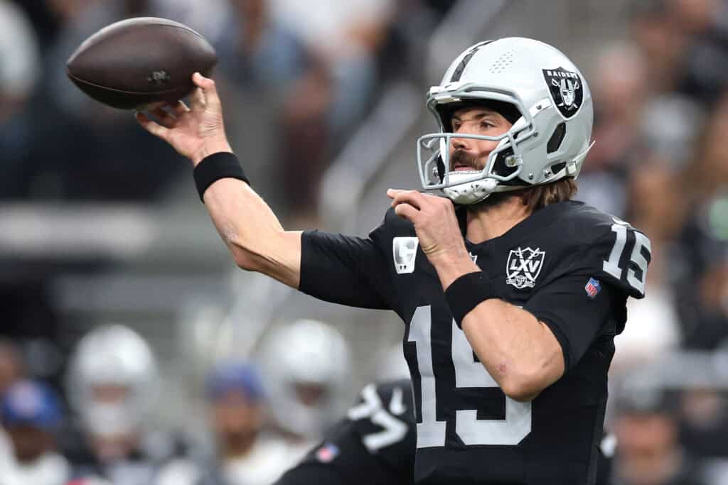 LAS VEGAS, NEVADA - OCTOBER 27: Gardner Minshew #15 of the Las Vegas Raiders passes the ball in the first quarter of a game against the Kansas City Chiefs at Allegiant Stadium on October 27, 2024 in Las Vegas, Nevada.