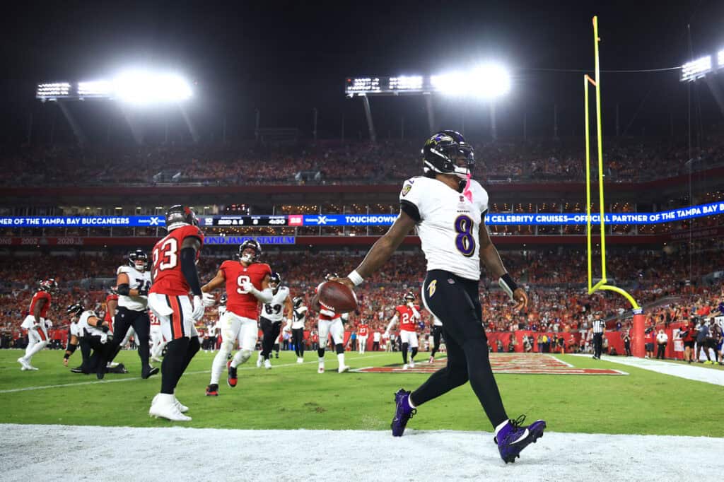 TAMPA, FLORIDA - OCTOBER 21: Lamar Jackson #8 of the Baltimore Ravens reacts after running the ball for a touchdown during the second quarter against the Tampa Bay Buccaneers at Raymond James Stadium on October 21, 2024 in Tampa, Florida. 