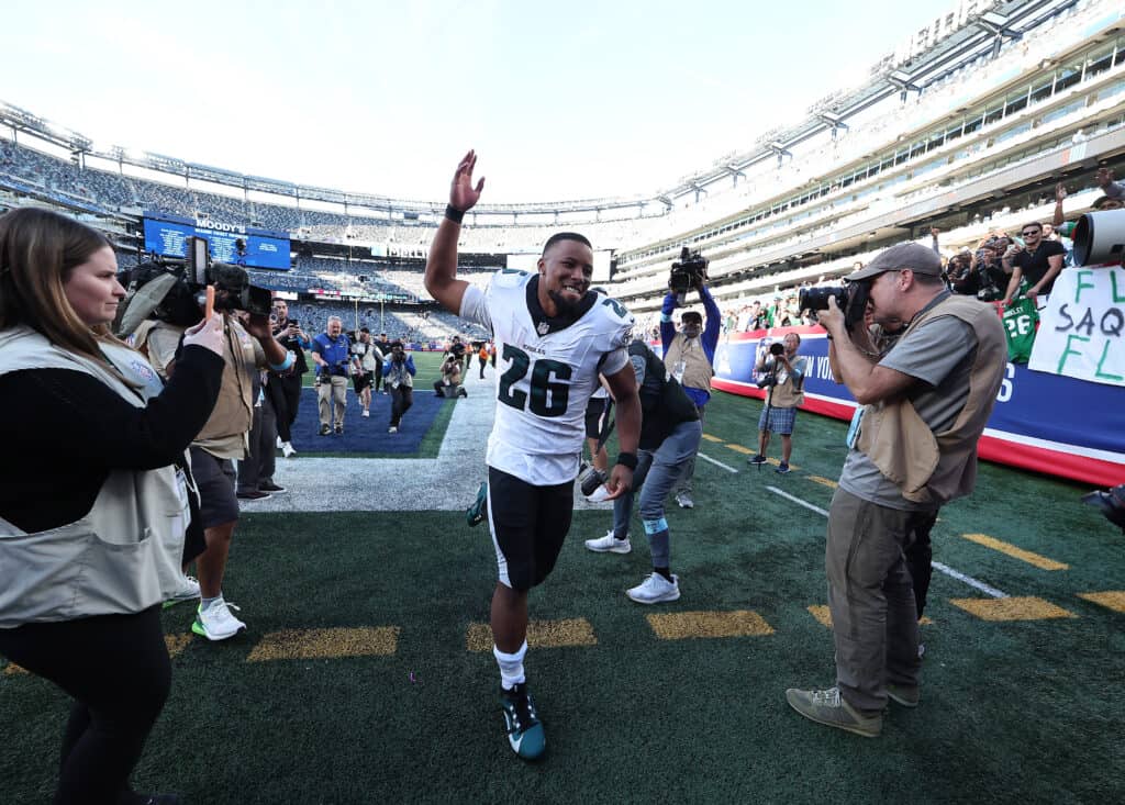 EAST RUTHERFORD, NEW JERSEY - OCTOBER 20: Saquon Barkley #26 of the Philadelphia Eagles celebrates after defeating the New York Giants 28-3 at MetLife Stadium on October 20, 2024 in East Rutherford, New Jersey. 