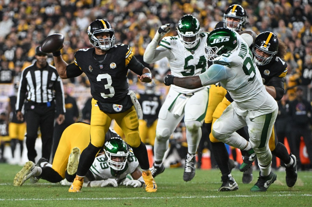 Russell Wilson throws a pass during the Steelers' win over the Jets on Oct. 20, 2024.