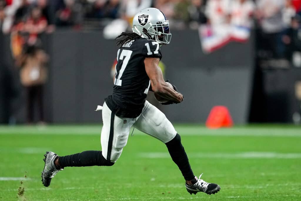 Davante Adams #17 of the Las Vegas Raiders carries the ball against the Kansas City Chiefs during the first half of the game at Allegiant Stadium on January 07, 2023 in Las Vegas, Nevada.