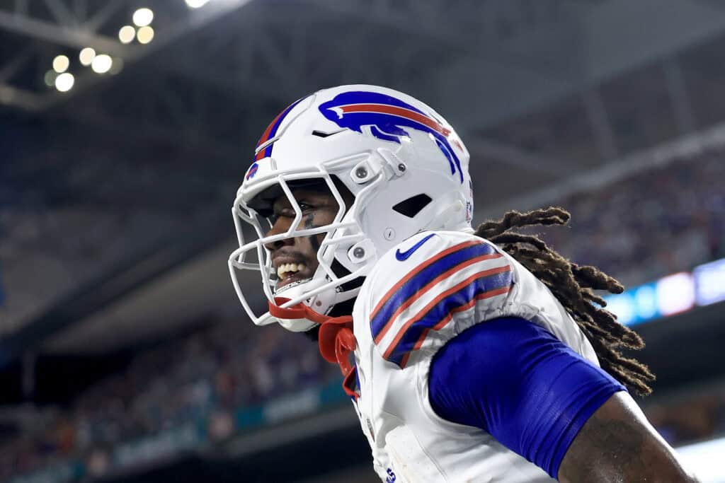 MIAMI GARDENS, FLORIDA - SEPTEMBER 12: James Cook #4 of the Buffalo Bills celebrates after scoring a touchdown against the Miami Dolphins during the first quarter in the game at Hard Rock Stadium on September 12, 2024 in Miami Gardens, Florida. 