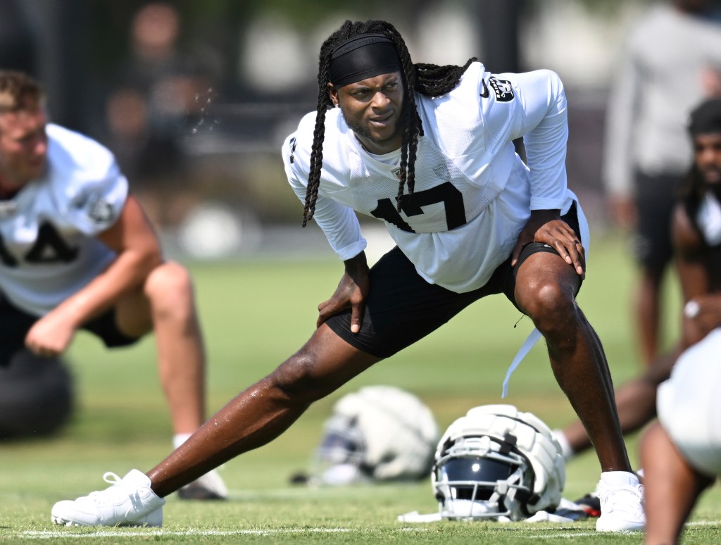 Raiders wide receiver Davante Adams works out during NFL football training camp, Thursday, July 25, 2024