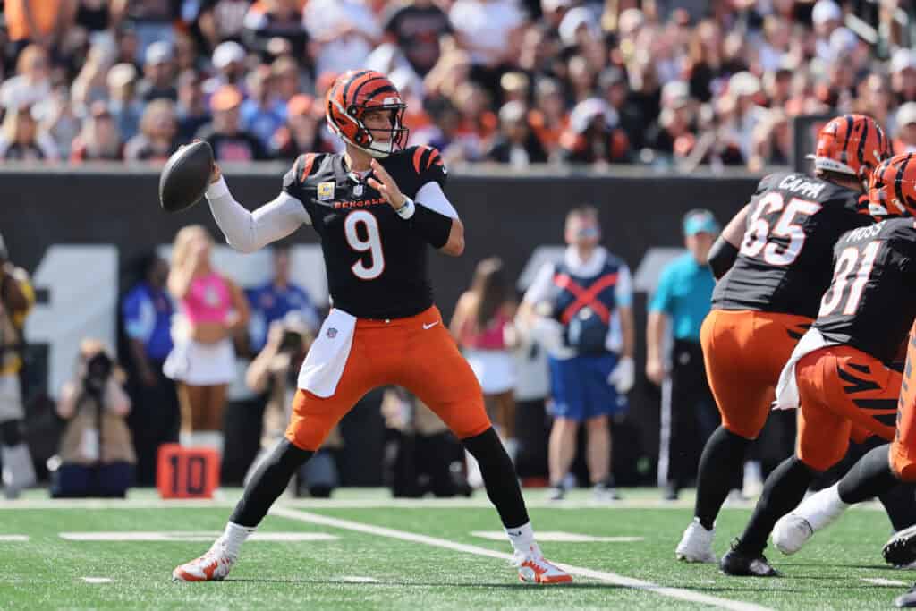 CINCINNATI, OHIO - OCTOBER 06: Joe Burrow #9 of the Cincinnati Bengals throws a pass against the Baltimore Ravens during the first quarter at Paycor Stadium on October 06, 2024 in Cincinnati, Ohio. 