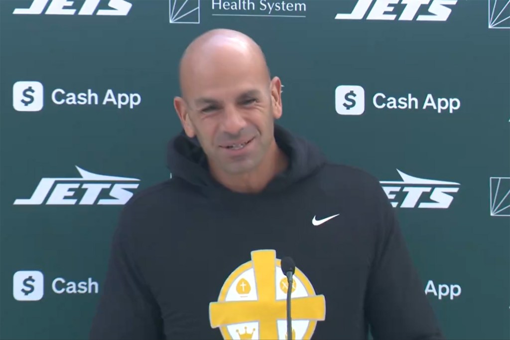 Robert Saleh addresses reporters in London on Oct. 4.