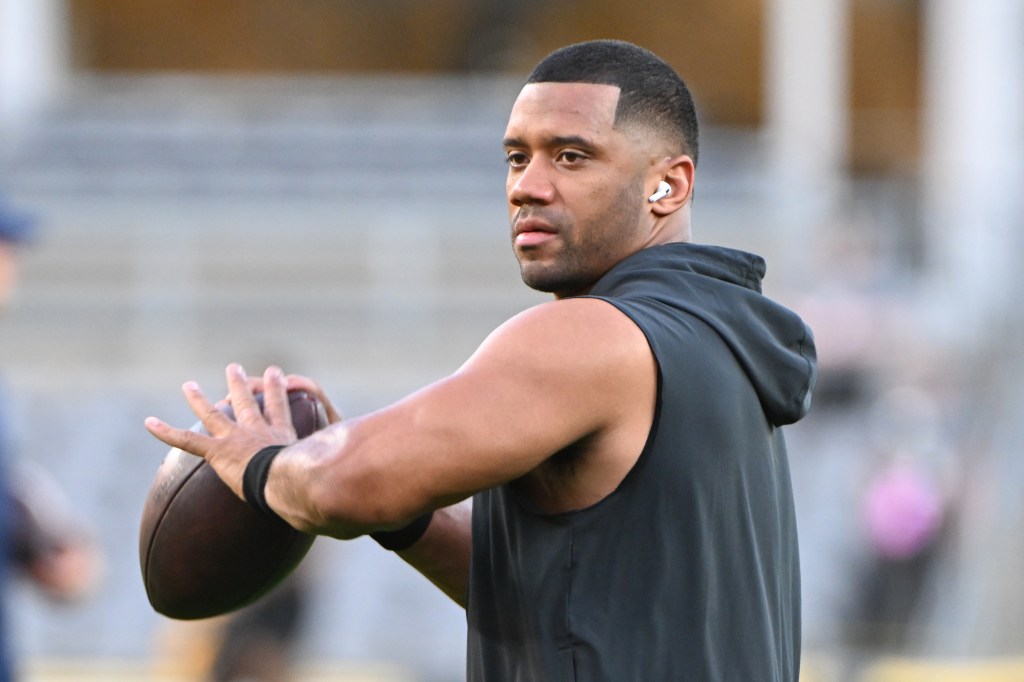 Pittsburgh Steelers quarterback Russell Wilson (3) works out before a game against the Dallas Cowboys at Acrisure Stadium.