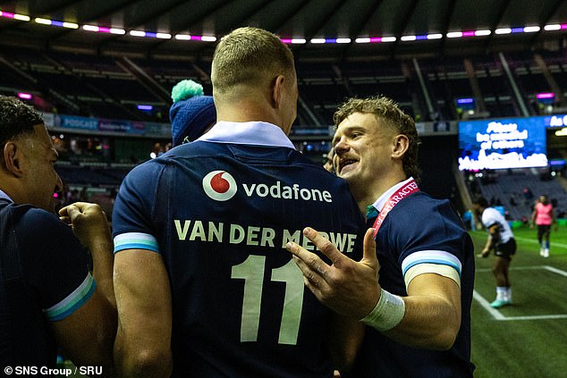 Relentless try scorers Van der Merwe and Graham enjoy a chat after the demolition of Fiji