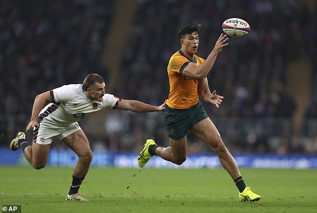 Suaalii made an explosive debut for the Wallabies against England (pictured) after being thrown in the deep end after the NRL season